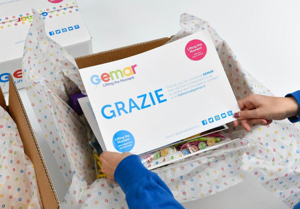 Gemar USA supports local balloon artists creating colorful event decorations.