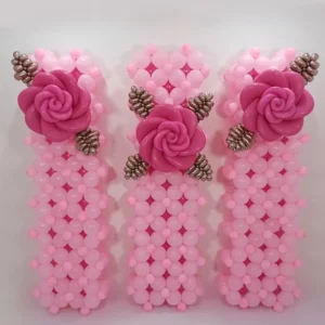 Pink balloon dress top with rose details, creative balloon fashion design for events