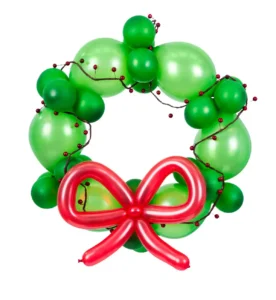 Green balloon wreath with festive red bow and holiday style