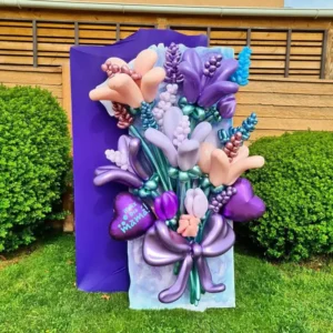 Shiny purple balloon flower arrangement with bow for event decoration