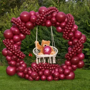 Vino balloon circle swing backdrop, whimsical outdoor balloon decoration with teddy bear